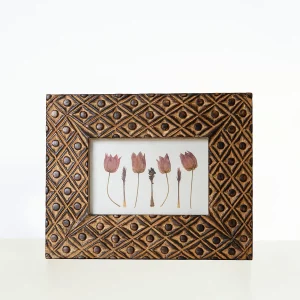 Cuadro con flor Pendientes de la reina